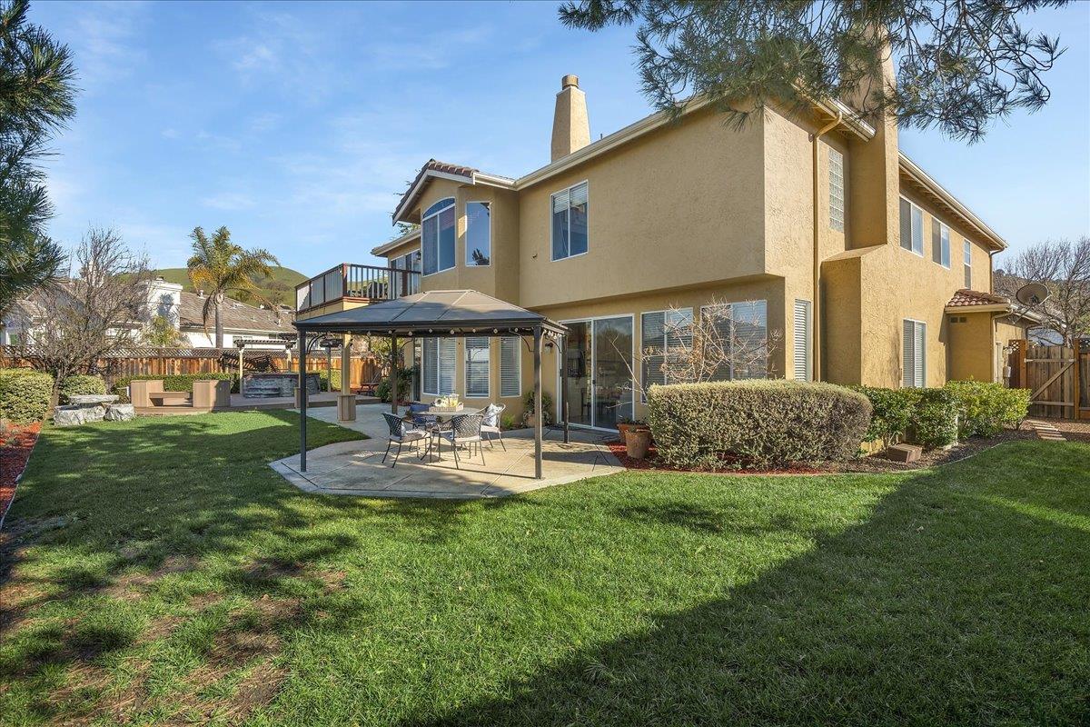 6315 Skywalker Drive San Jose, CA 95135 - Photo 29 of 34 a front view of a house with a yard table and chairs