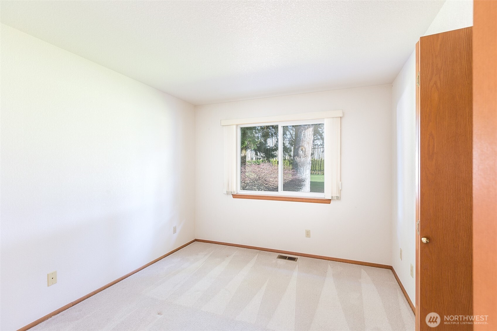170 Hurricane Ridge Drive Sequim, WA 98382 - Photo 28 of 39 a view of an empty room with a window