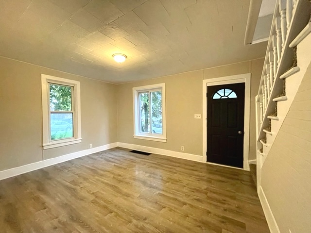238 Lucas Street Sycamore, IL 60178 - Photo 3 of 28 a view of an empty room with a window
