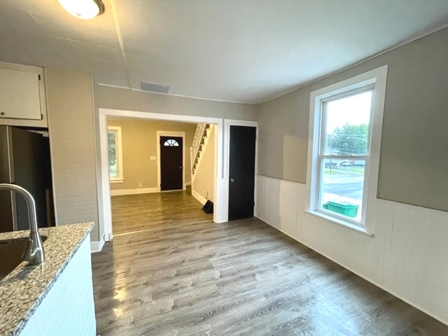 238 Lucas Street Sycamore, IL 60178 - Photo 9 of 28 a view of a living room a window and wooden floor