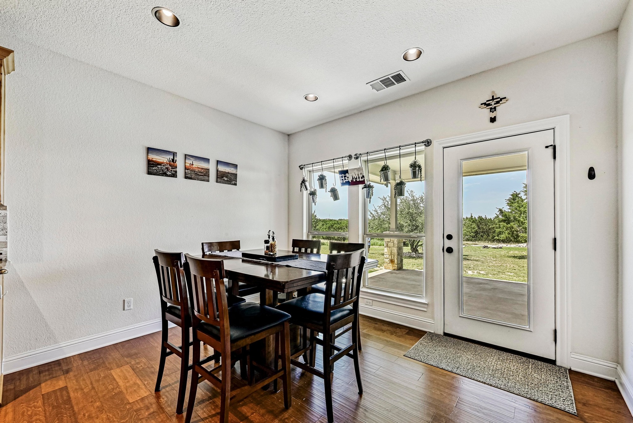 312 First Down Dash Burnet, TX 78611 - Photo 13 of 39 a view of a dining room with furniture window and wooden floor