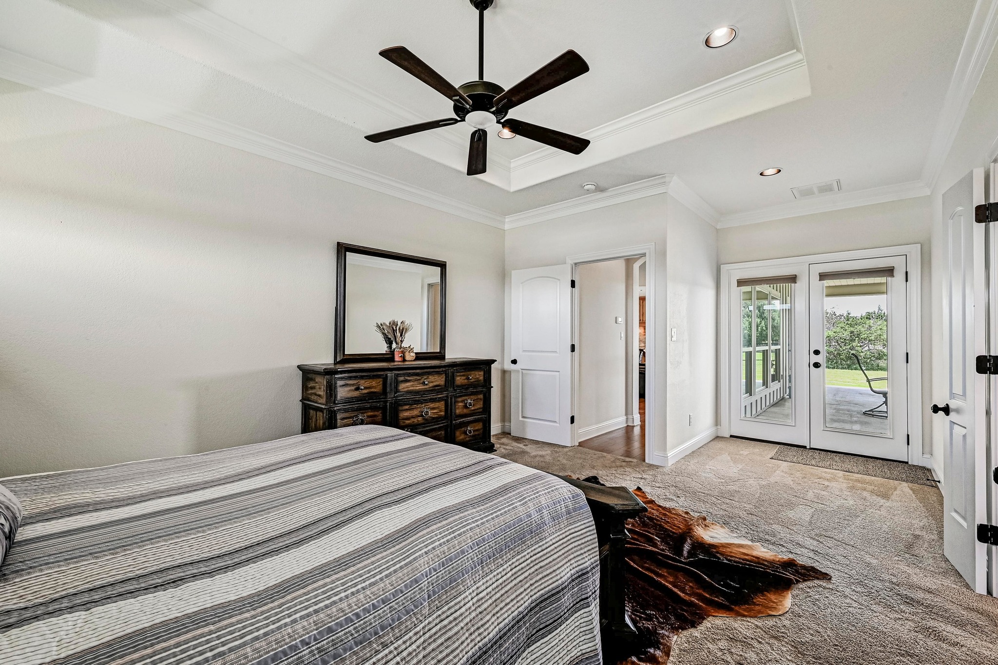 312 First Down Dash Burnet, TX 78611 - Photo 17 of 39 a bedroom with a bed and a large window