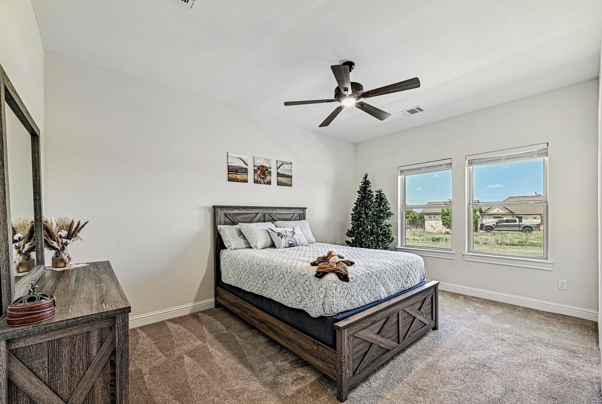 312 First Down Dash Burnet, TX 78611 - Photo 21 of 39 a bedroom with a bed and a window