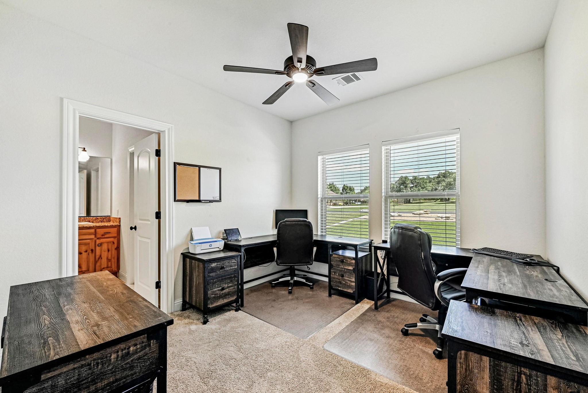 312 First Down Dash Burnet, TX 78611 - Photo 25 of 39 a view of a livingroom with workspace and a window