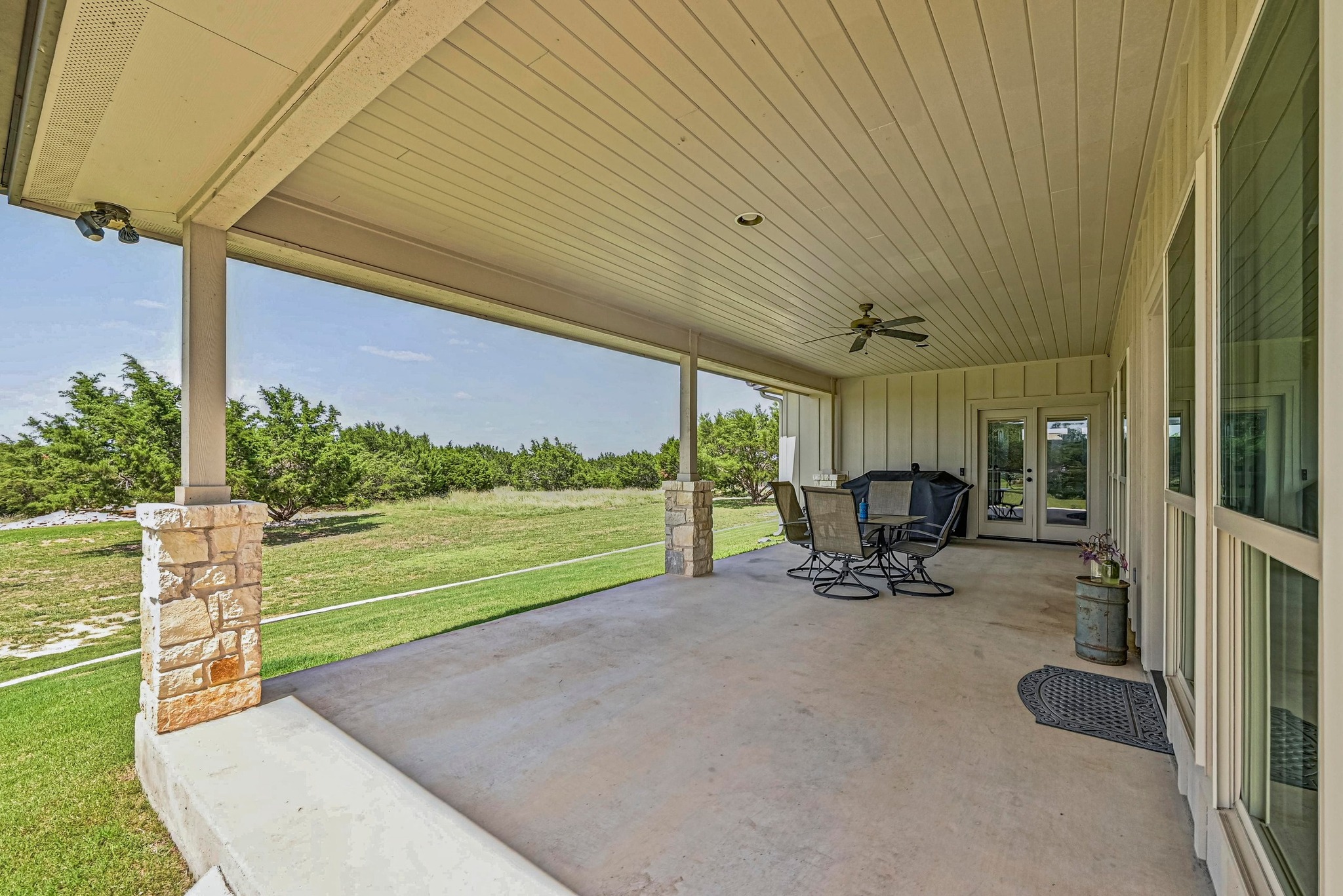 312 First Down Dash Burnet, TX 78611 - Photo 30 of 39 a view of a two chair in the patio next to a yard
