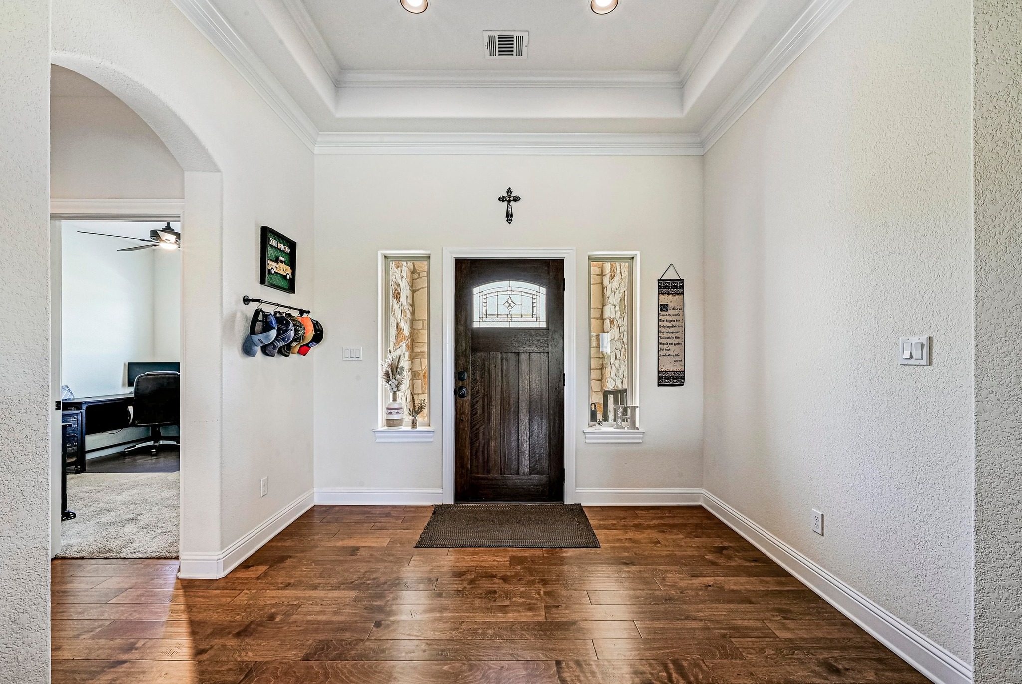 312 First Down Dash Burnet, TX 78611 - Photo 3 of 39 a view of a hallway view with wooden floor and staircase