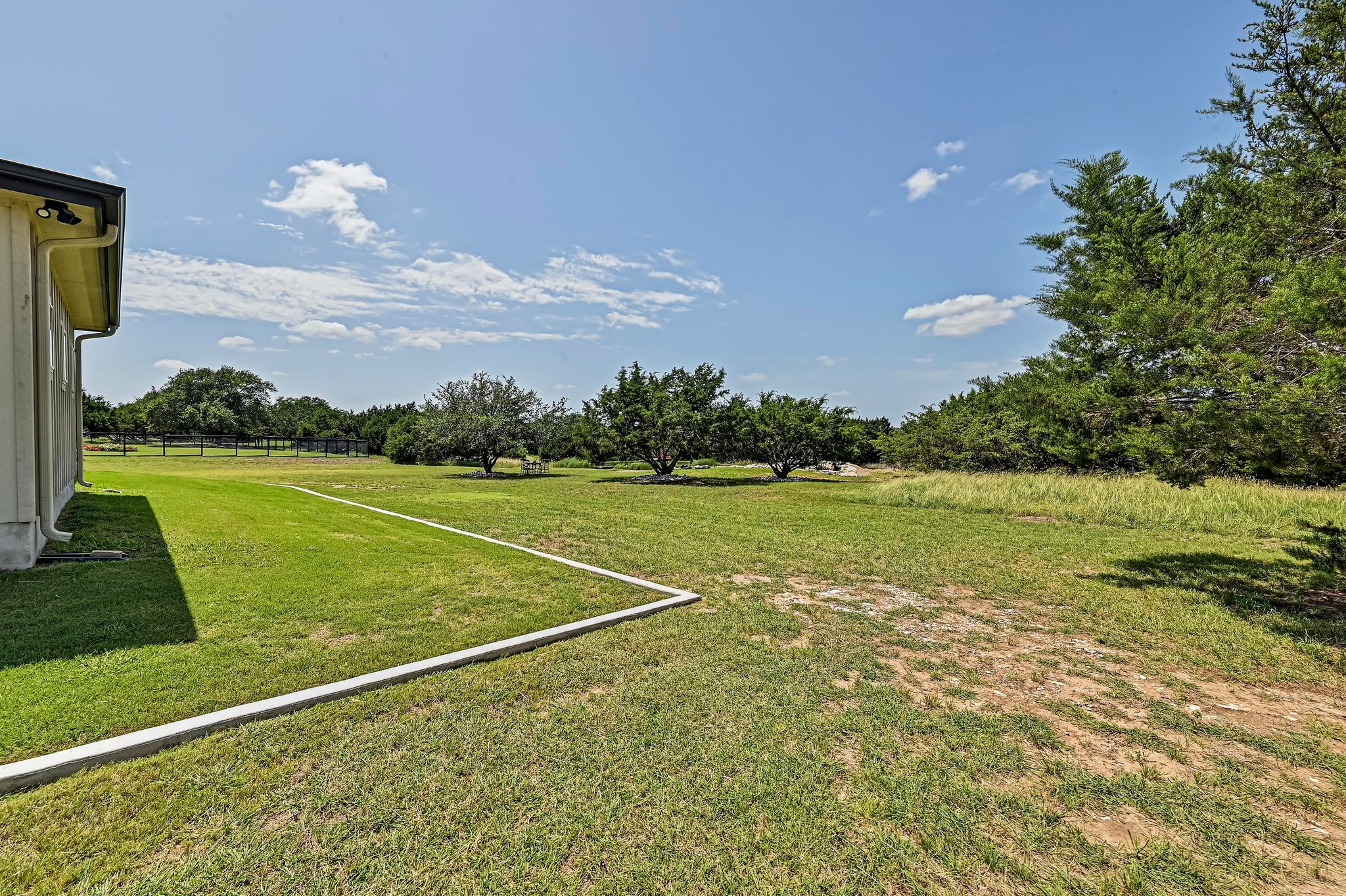 312 First Down Dash Burnet, TX 78611 - Photo 31 of 39 a view of a big room with a big yard and plants
