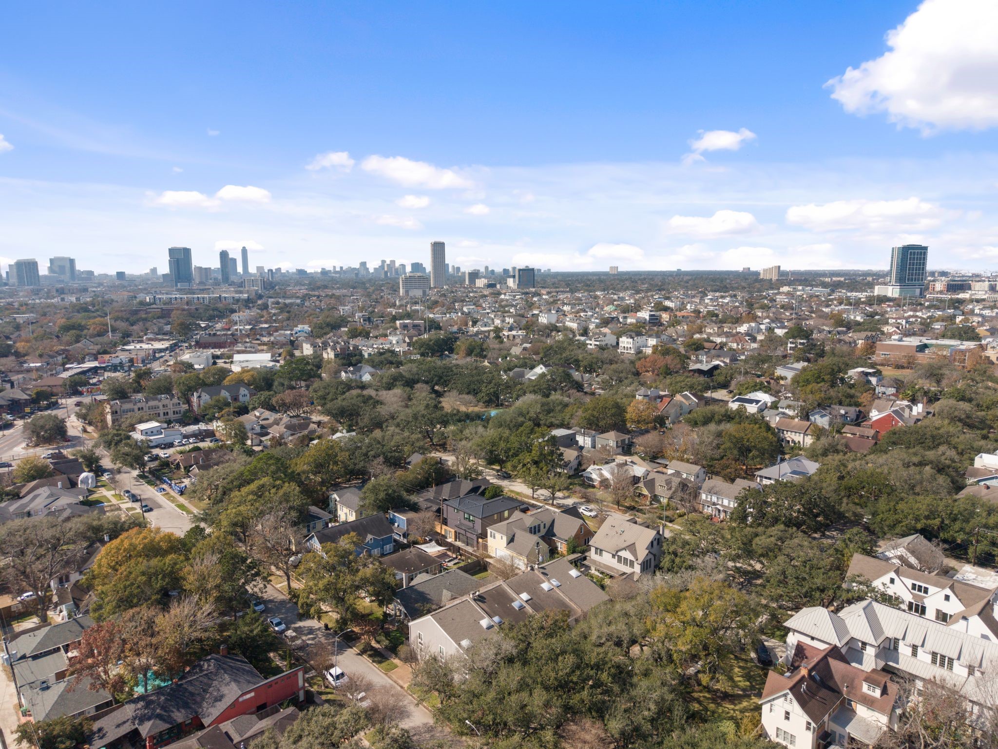 2612 Yupon Street Houston, TX 77006 - Photo 39 of 40 Drone perspective captures the surrounding Montrose and Cherryhurst neighborhood, emphasizing central location and connectivity.