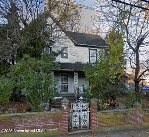 a front view of house with yard