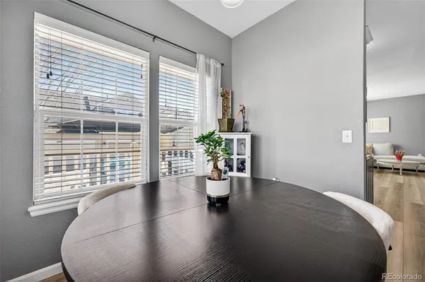 a workspace with furniture and a window