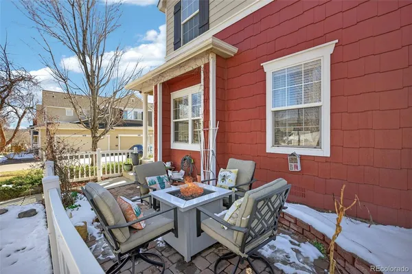 a view of a chairs and table in the patio