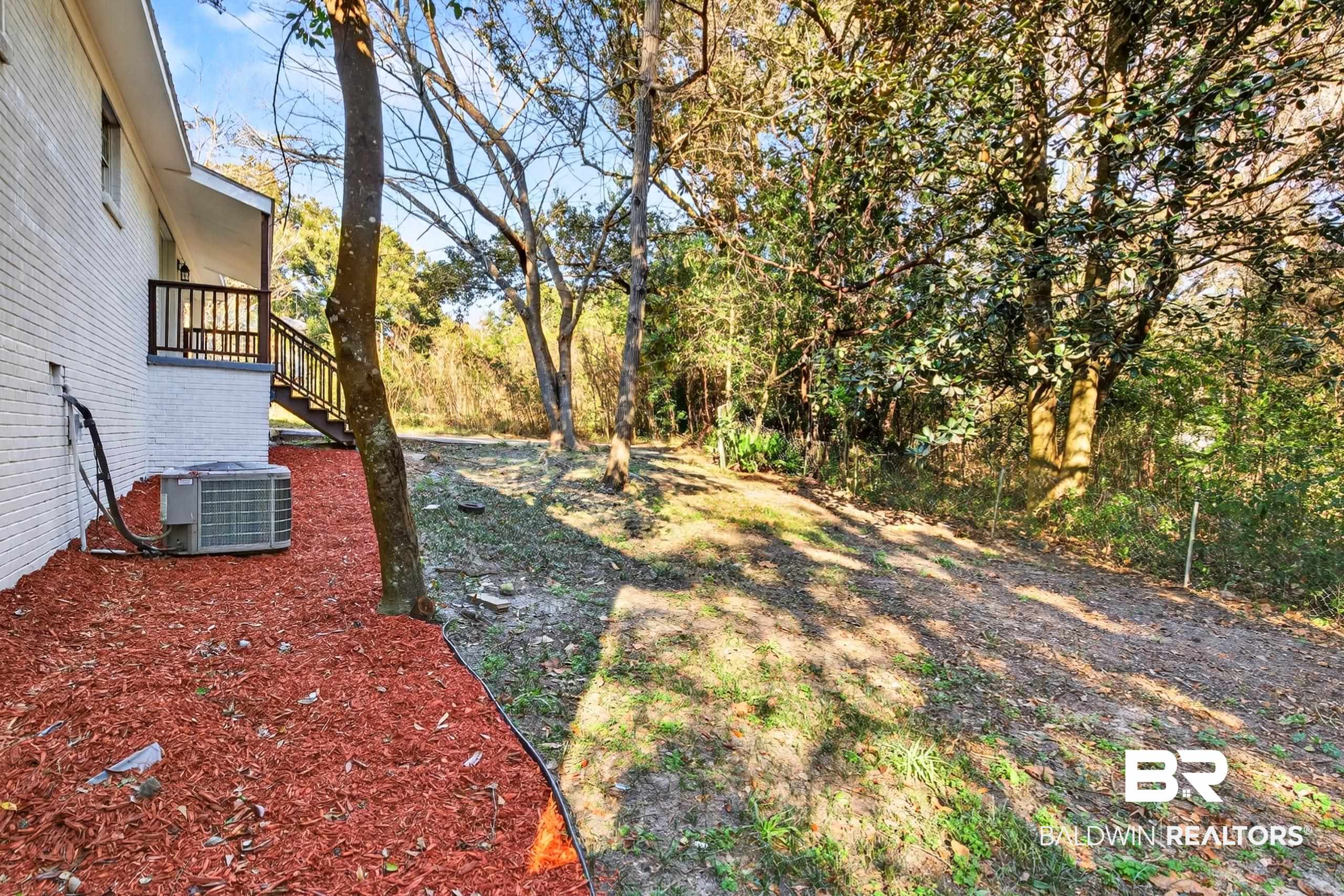 30902 Stanton Road Spanish Fort, AL 36527 - Photo 24 of 27 View of yard featuring stairs
