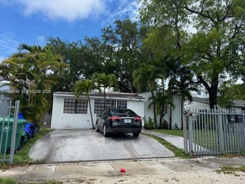 a car parked in front of a house