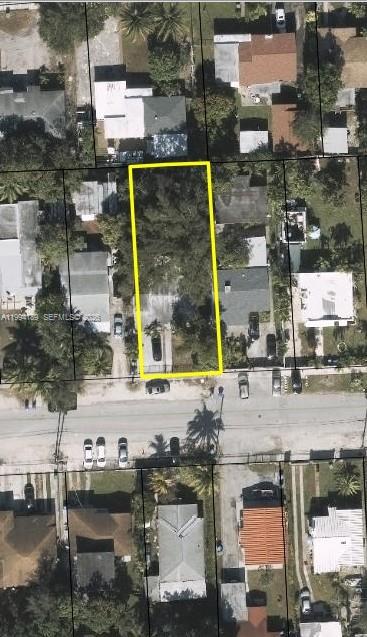 97 Northwest 69th Street Miami, FL 33150 - Photo 3 of 3 an aerial view of houses with outdoor space
