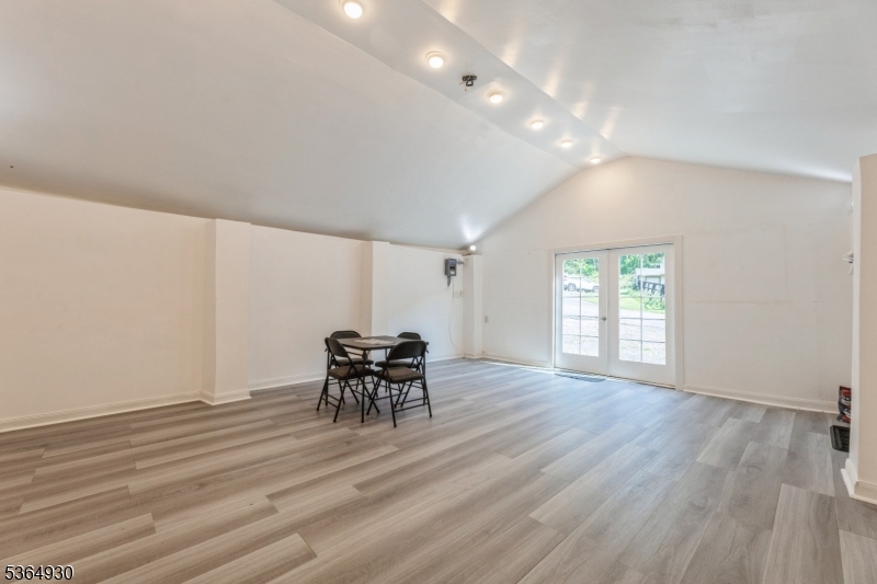 10 Pidgeon Hill Road Wantage, NJ 07461 - Photo 13 of 45 an empty room with wooden floor and furniture