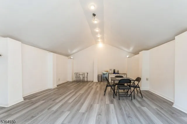 a view of a pool with a yard