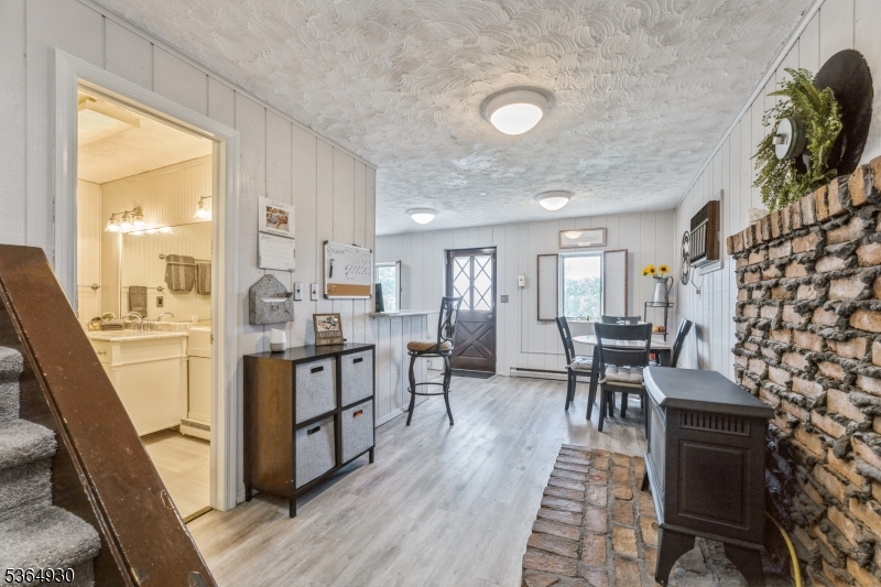 10 Pidgeon Hill Road Wantage, NJ 07461 - Photo 23 of 45 a living room with furniture and wooden floor