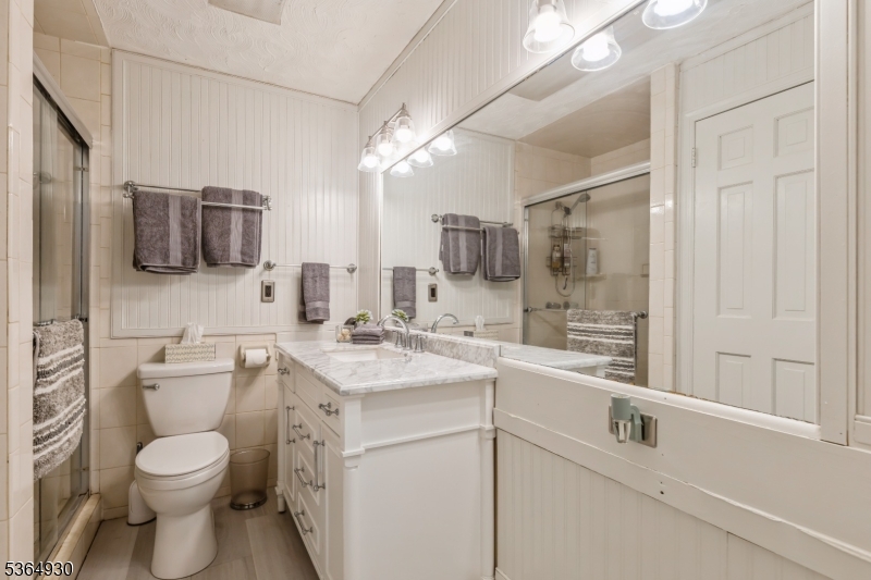 10 Pidgeon Hill Road Wantage, NJ 07461 - Photo 24 of 45 a view of bathroom with a sink and mirror