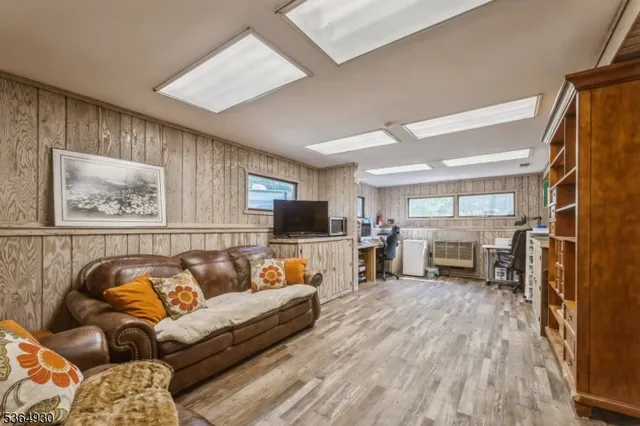 a kitchen that has a lot of cabinets a sink and a stove