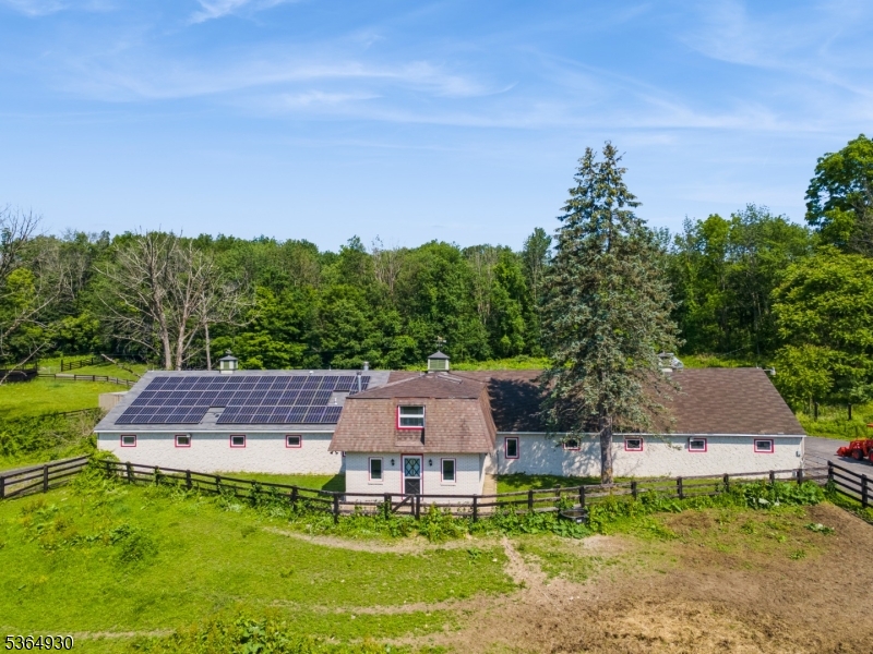10 Pidgeon Hill Road Wantage, NJ 07461 - Photo 4 of 45 an aerial view of a house with garden space and street view