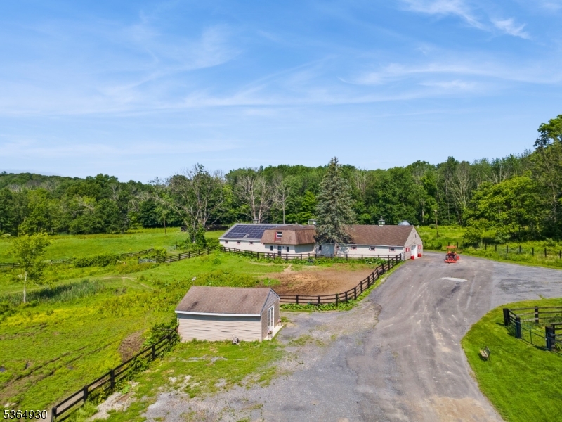10 Pidgeon Hill Road Wantage, NJ 07461 - Photo 7 of 45 a view of a swimming pool with a yard
