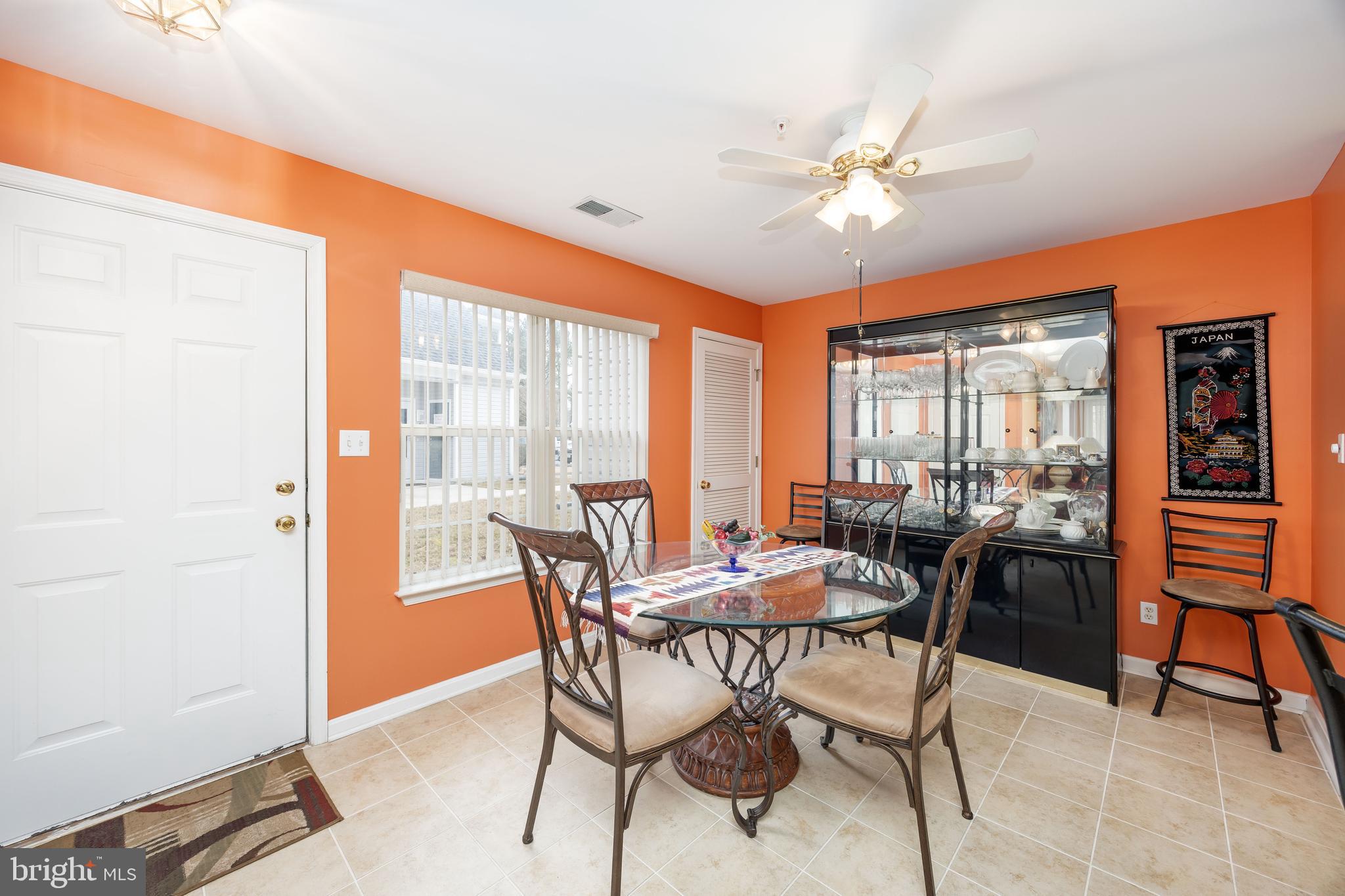 11427 Manklin Creek Road, Unit 7 Ocean Pines, MD 21811 - Photo 13 of 42 a view of a dining room with furniture window and outside view