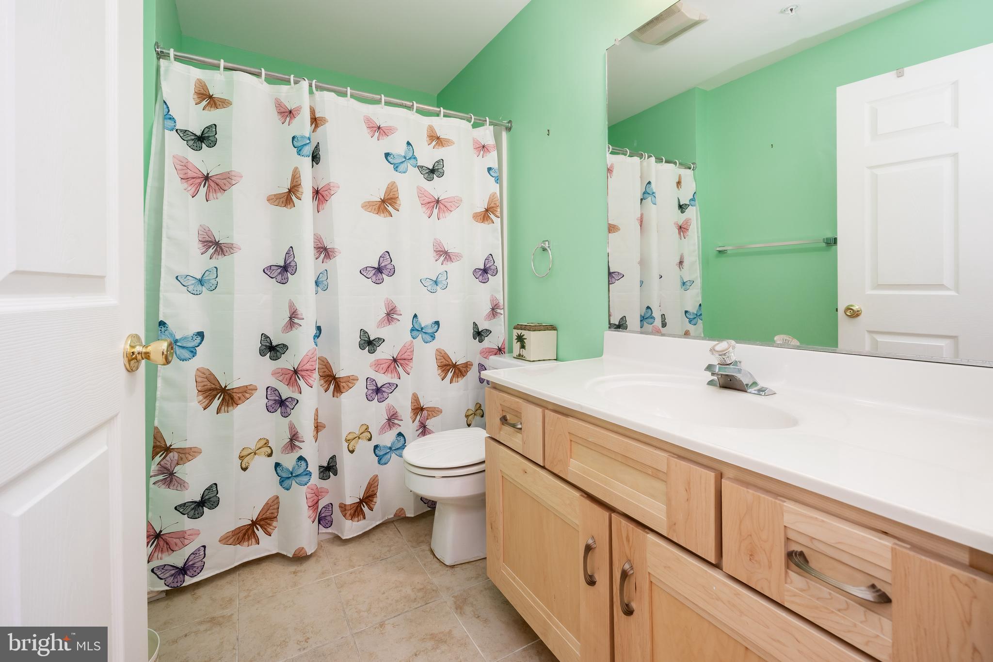 11427 Manklin Creek Road, Unit 7 Ocean Pines, MD 21811 - Photo 23 of 42 a bathroom with a sink and a toilet