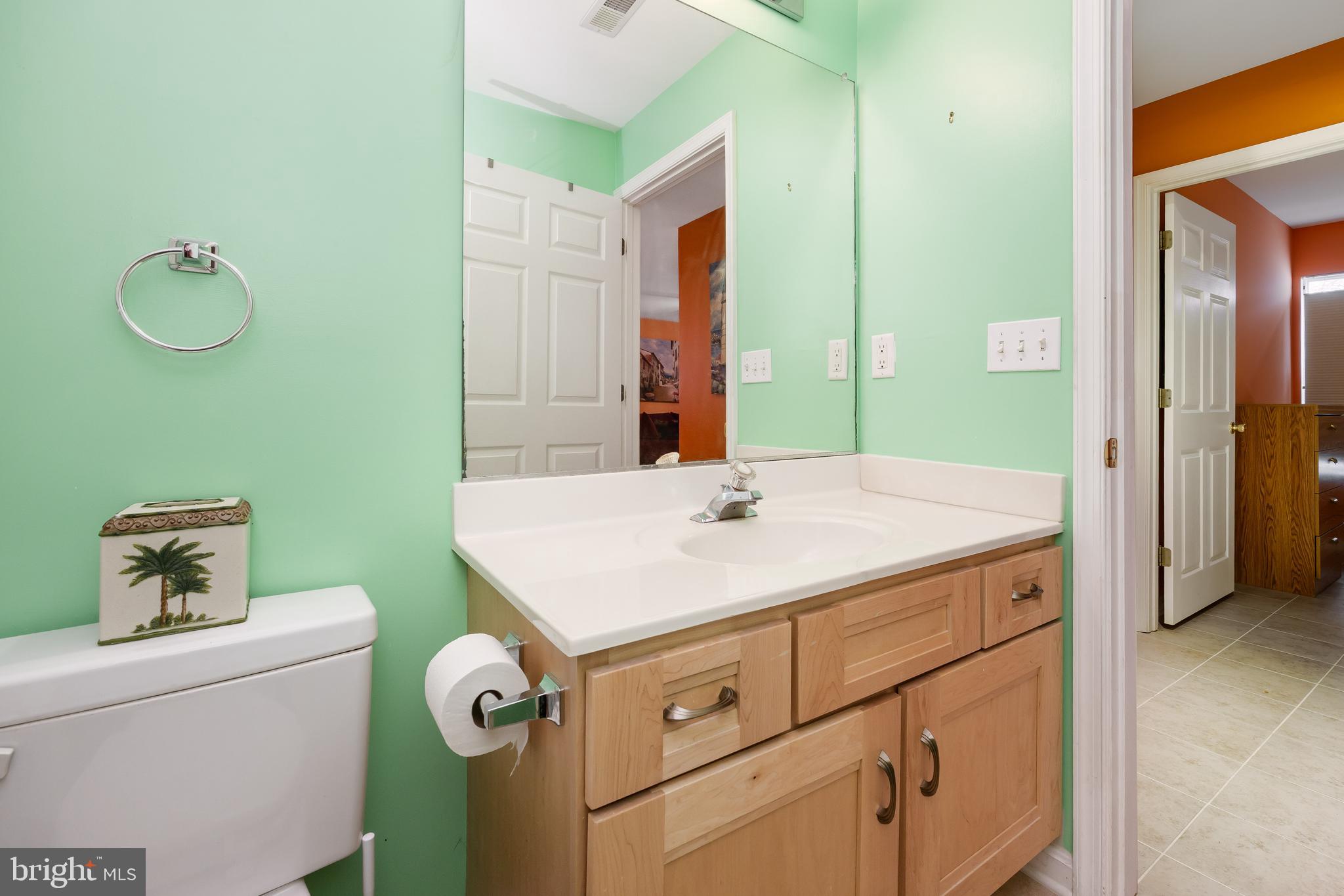 11427 Manklin Creek Road, Unit 7 Ocean Pines, MD 21811 - Photo 24 of 42 a bathroom with a sink and a mirror