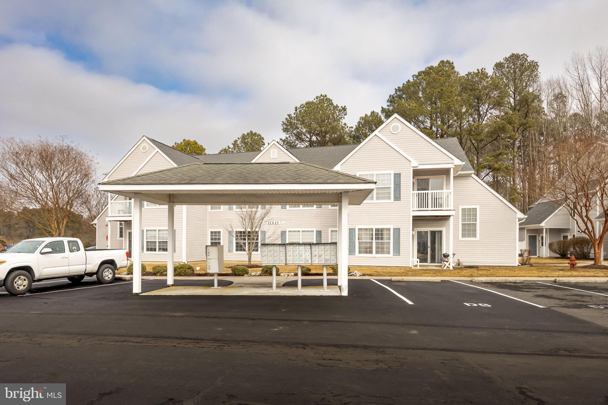 11427 Manklin Creek Road, Unit 7 Ocean Pines, MD 21811 - Photo 42 of 42 a view of a building with a street