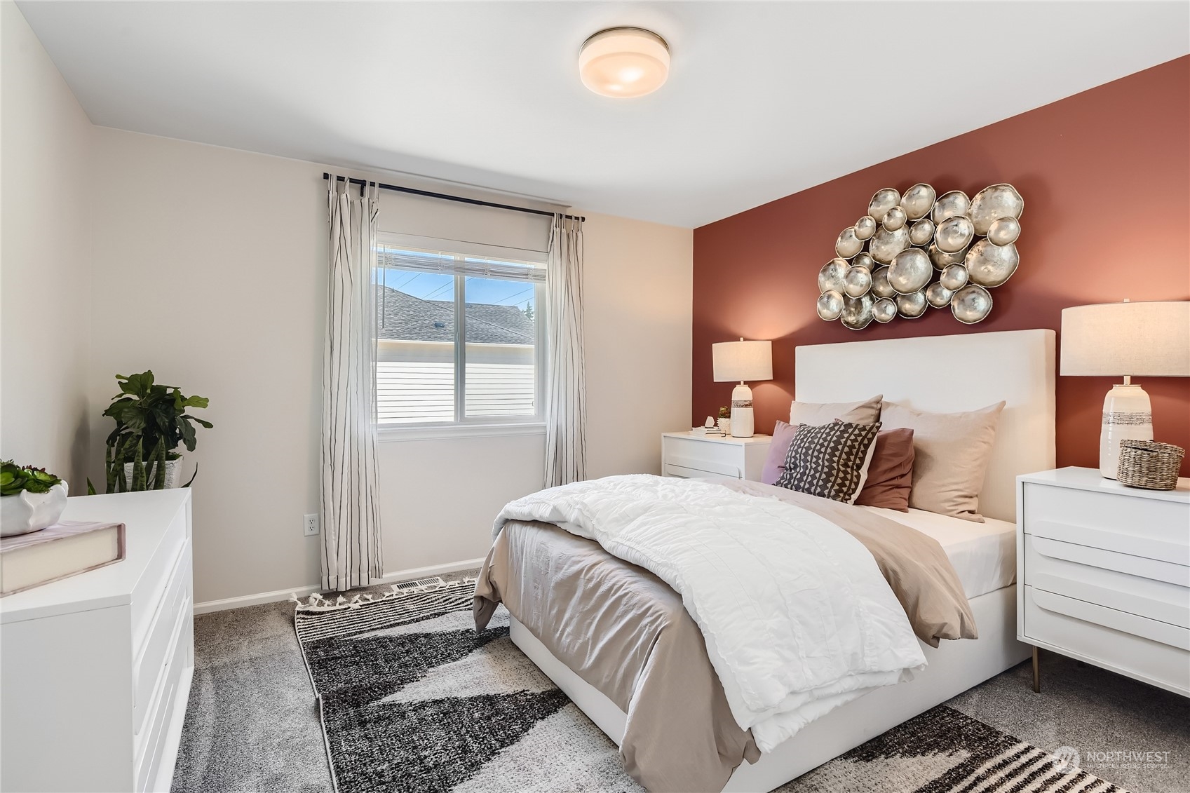 20906 42nd Drive Southeast, Unit 143 Bothell, WA 98021 - Photo 3 of 22 a bedroom with a bed and a window