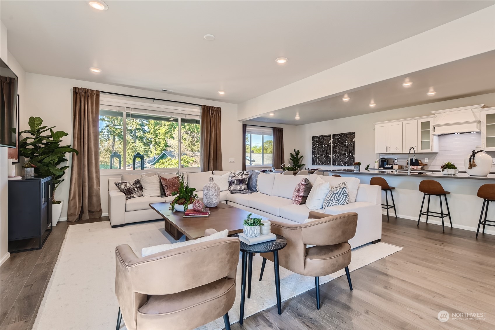20906 42nd Drive Southeast, Unit 143 Bothell, WA 98021 - Photo 9 of 22 a living room with furniture and a large window