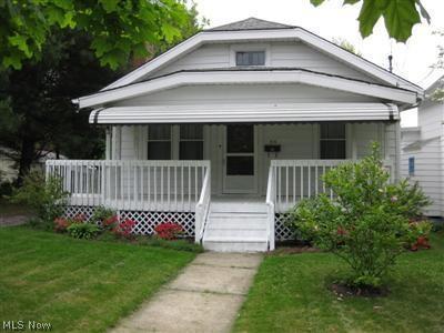 715 Damon Street Akron, OH 44310 - Photo 1 of 1 View of front of home from Damon Street. Wicker furniture, a porch swing and you are all that is missing from this picture.