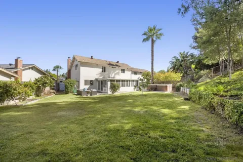 a house view with a outdoor space