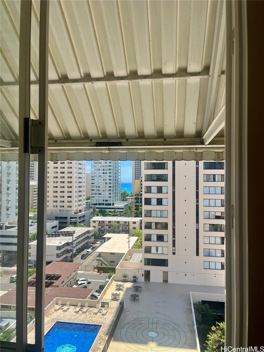 2415 Ala Wai Boulevard, Unit 1208 Honolulu, HI 96815 - Photo 3 of 13 a view of a balcony with door