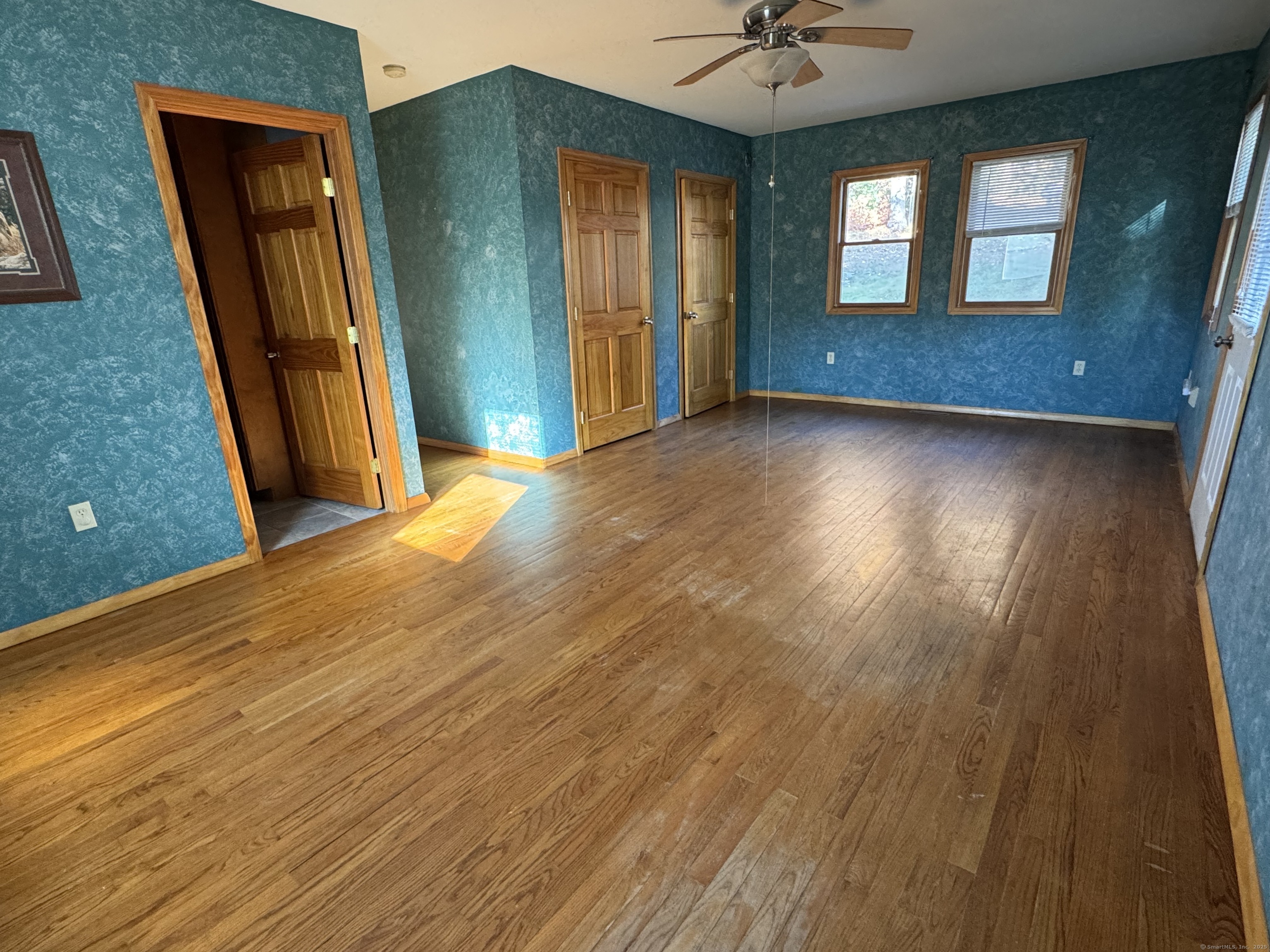 104 Cemetery Road Vernon, CT 06066 - Photo 12 of 28 wooden floor in an empty room with a window