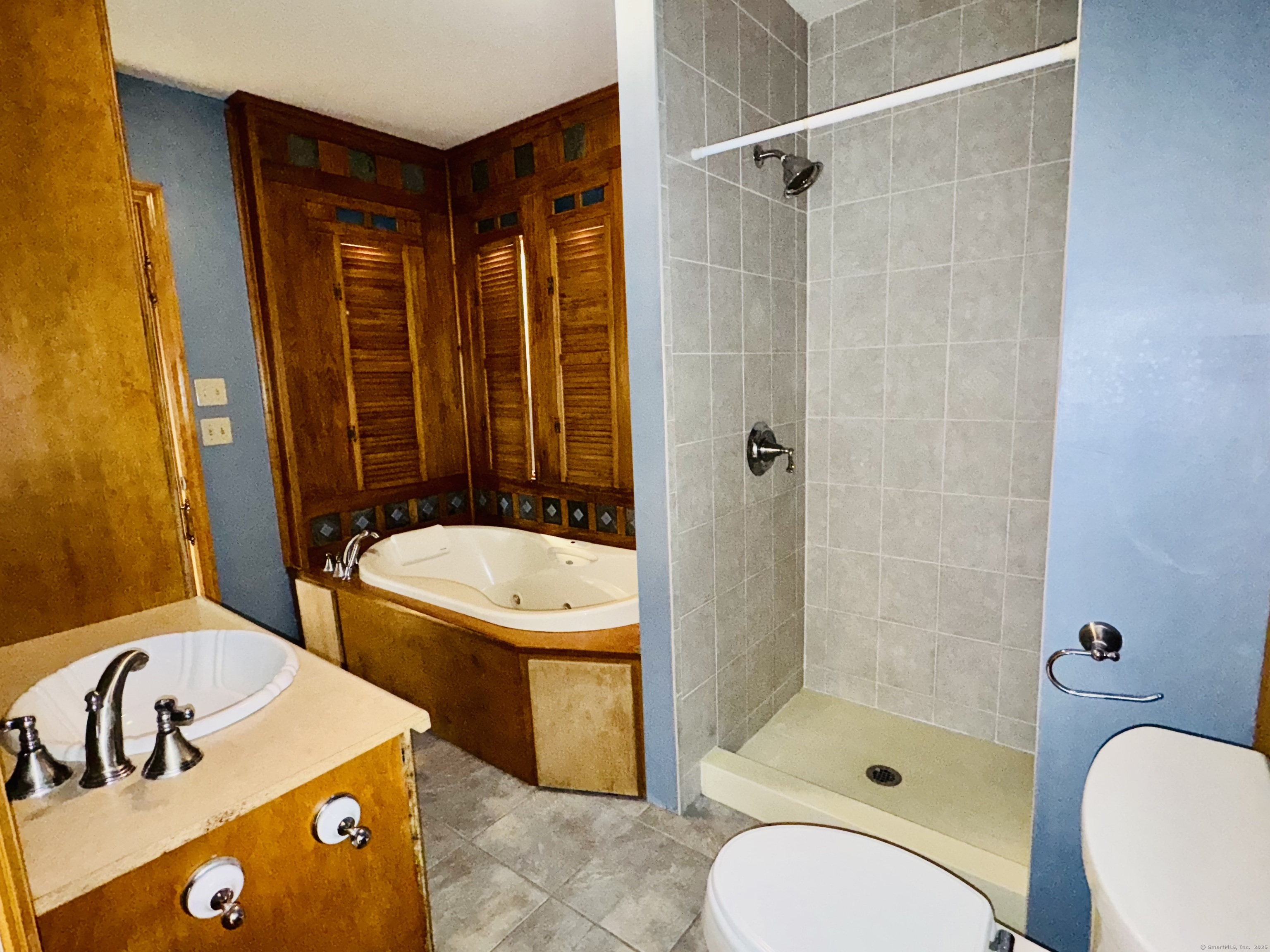 104 Cemetery Road Vernon, CT 06066 - Photo 15 of 28 a bathroom with a sink toilet and shower