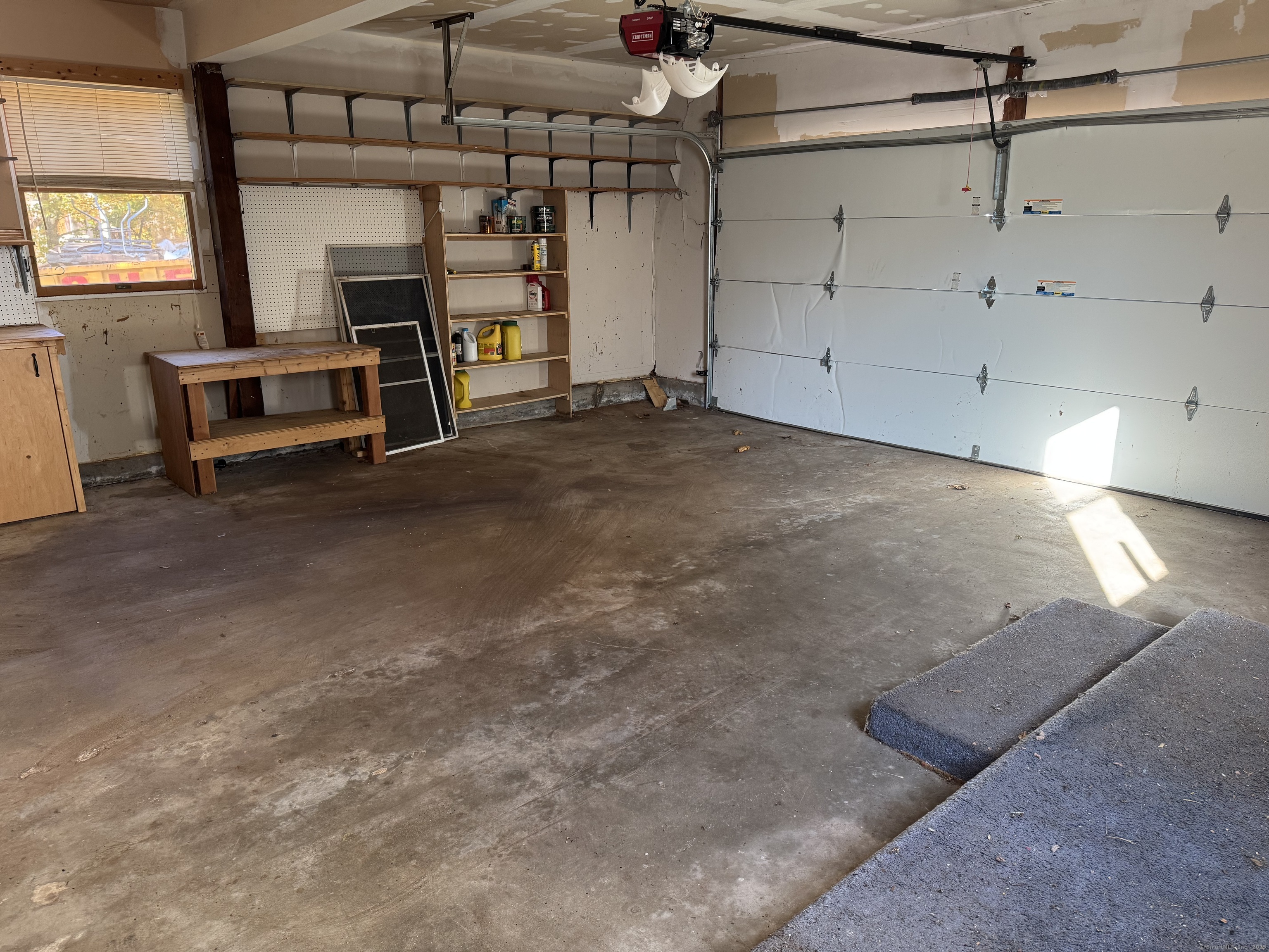 104 Cemetery Road Vernon, CT 06066 - Photo 23 of 28 a view of a livingroom with furniture and staircase