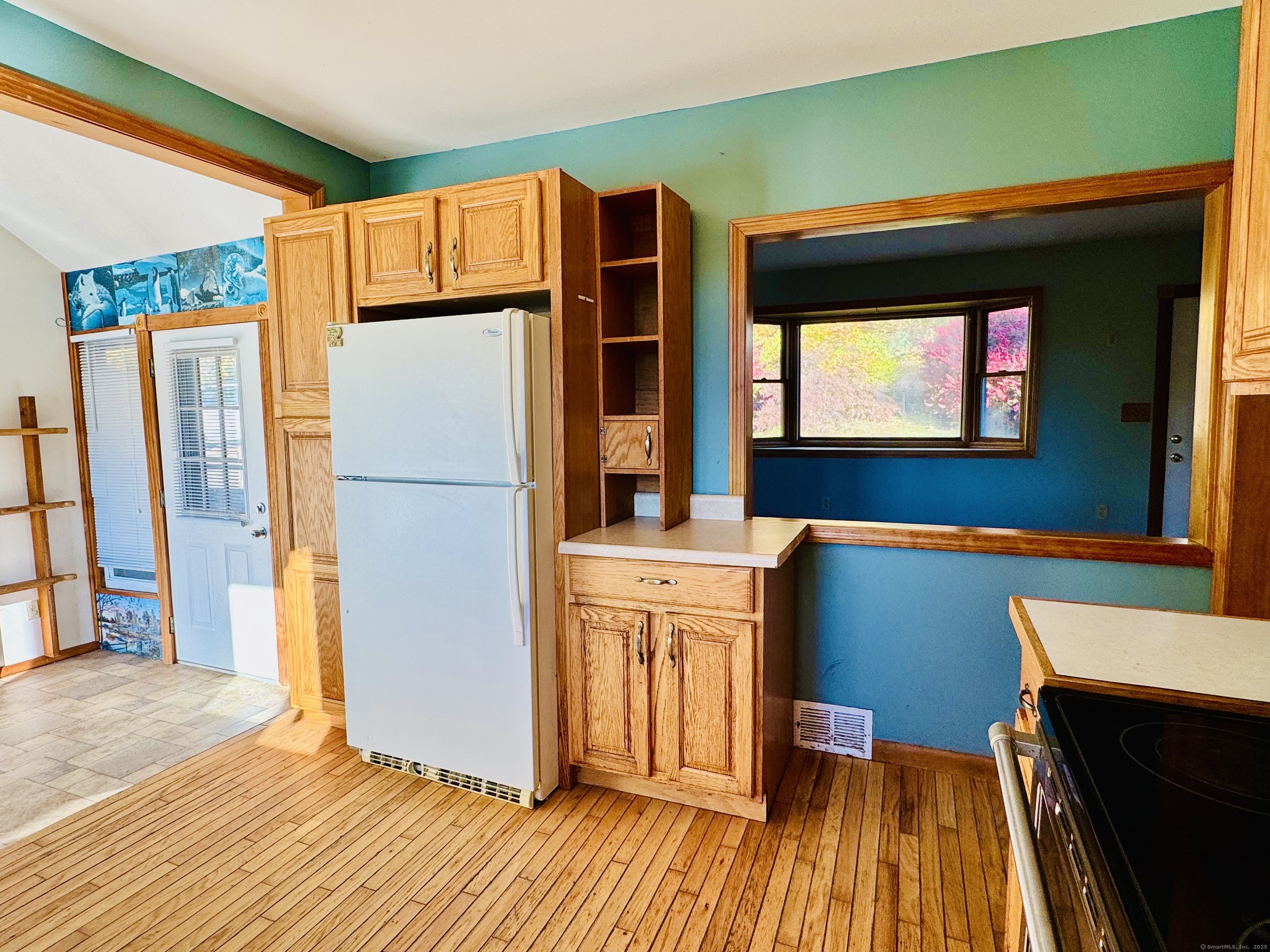 104 Cemetery Road Vernon, CT 06066 - Photo 6 of 28 a kitchen with stainless steel appliances granite countertop a refrigerator and a sink