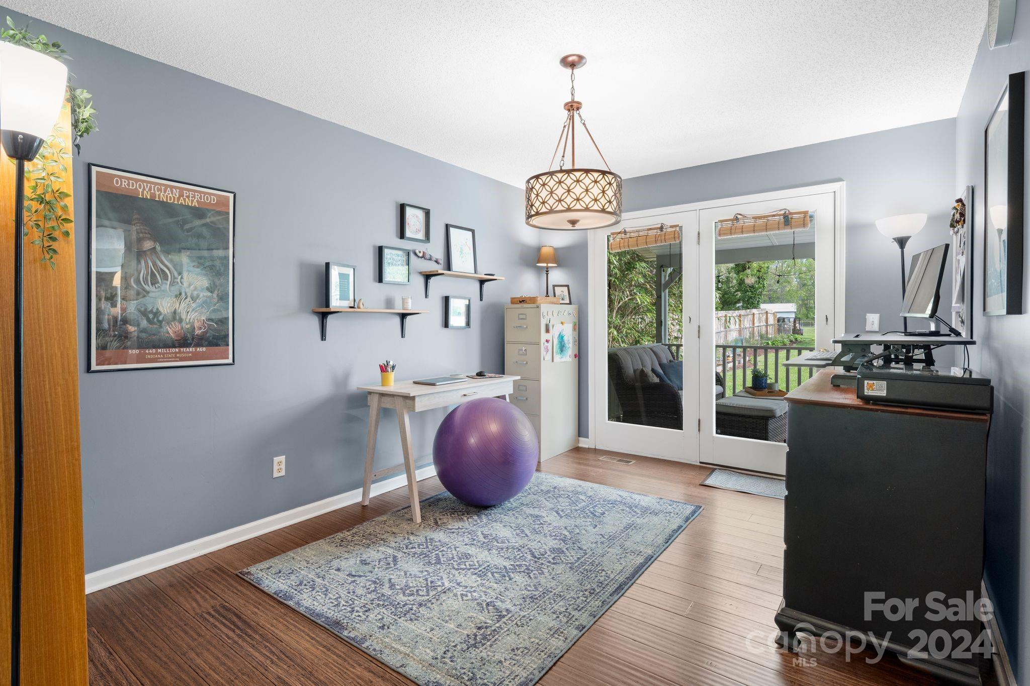 9 Mountain View Drive Arden, NC 28704 - Photo 7 of 19 a view of a livingroom with furniture window and wooden floor