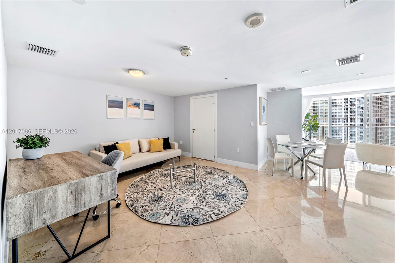 200 Biscayne Blvd Way, Unit 4308 Miami, FL 33131 - Photo 5 of 31 a living room with furniture