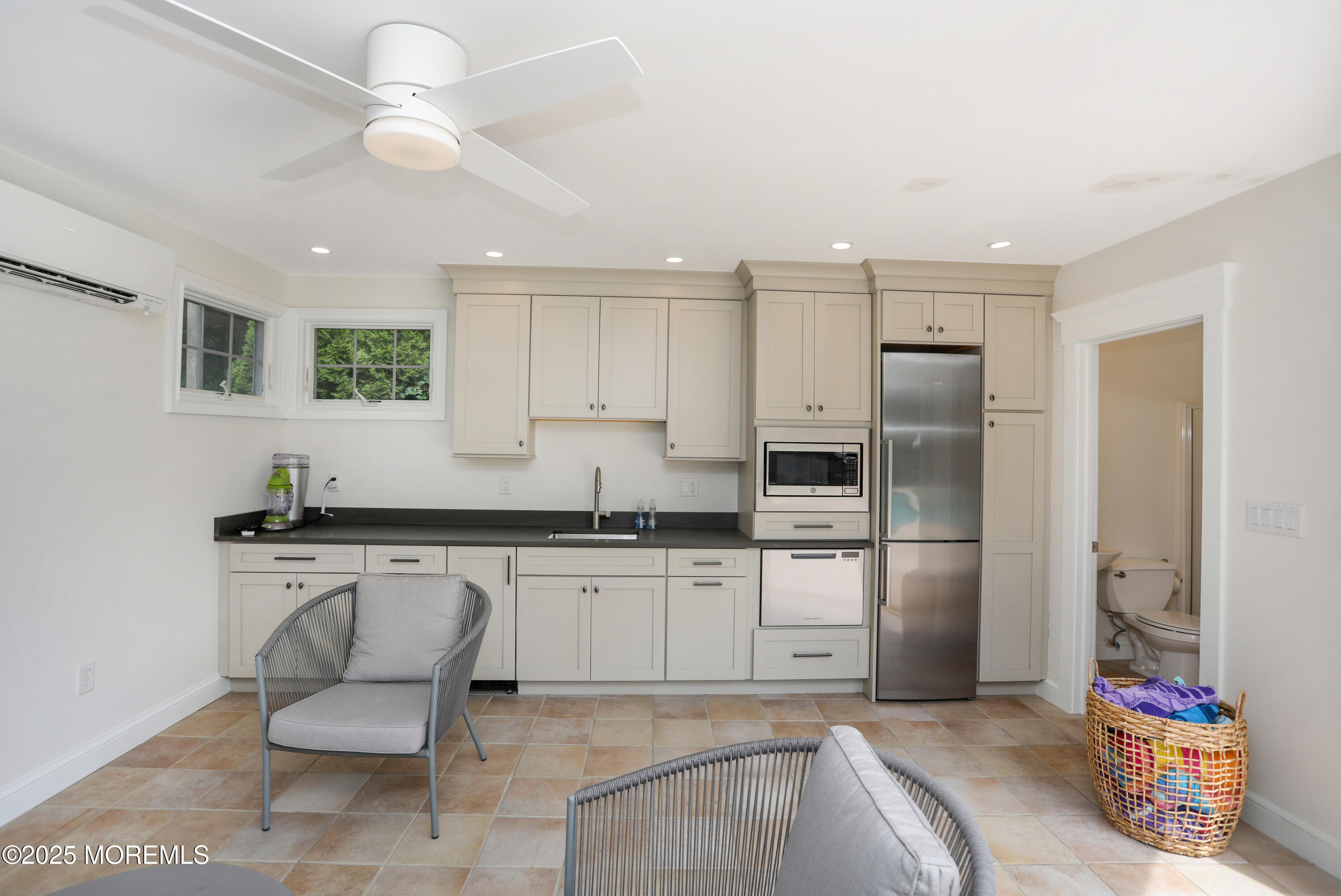 38 Vroom Avenue Spring Lake, NJ 07762 - Photo 15 of 15 a kitchen with a sink cabinets and stainless steel appliances