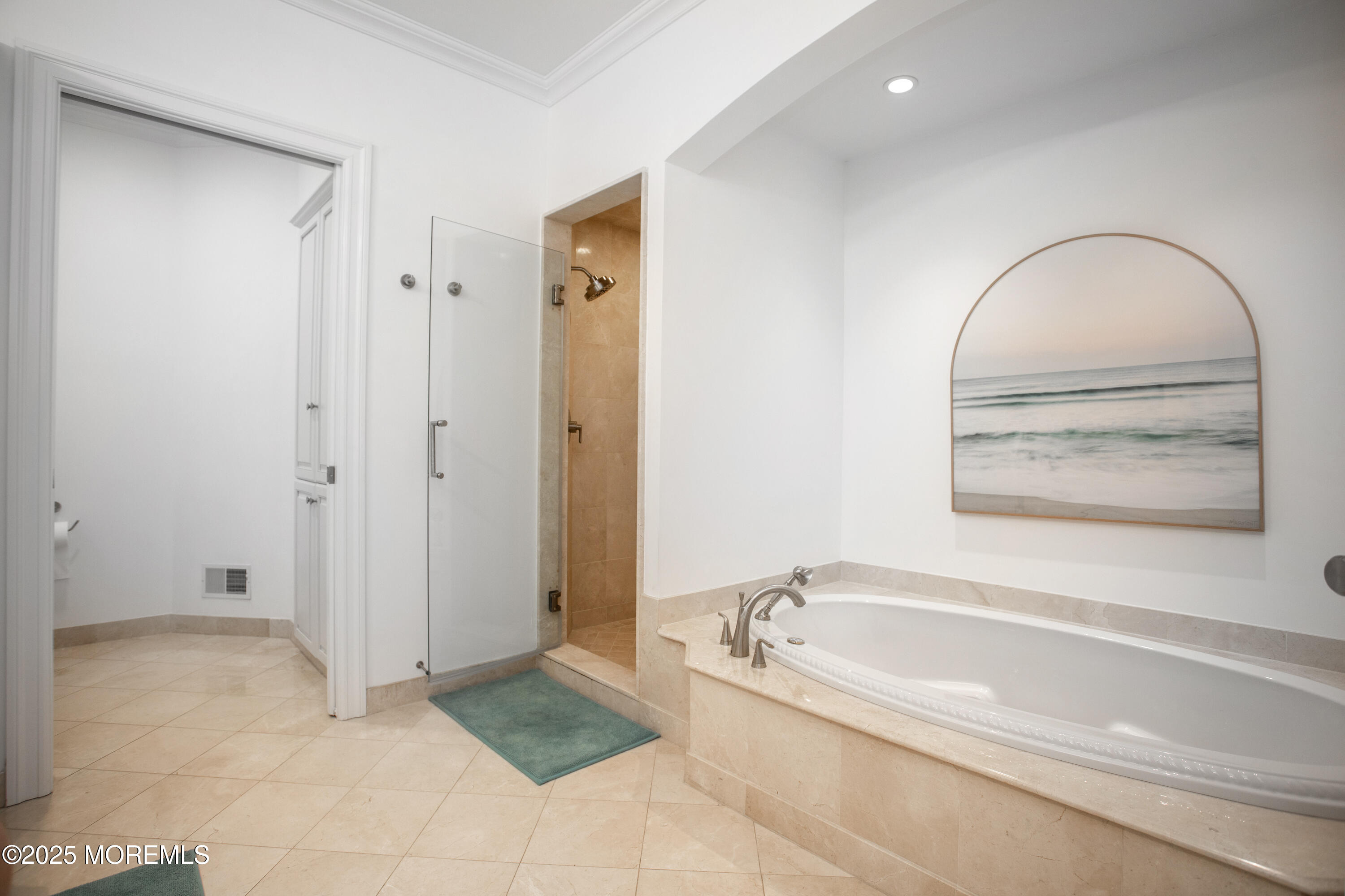 38 Vroom Avenue Spring Lake, NJ 07762 - Photo 9 of 15 a spacious bathroom with a tub shower and a sink