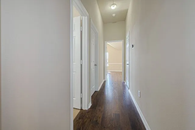 a kitchen with a stove microwave and refrigerator