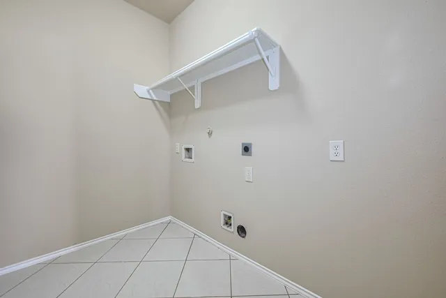 a view of a house with a yard and a porch