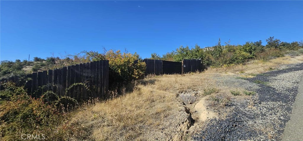 13495 Concow Road Oroville, CA 95965 - Photo 5 of 9 a view of a yard with a tree