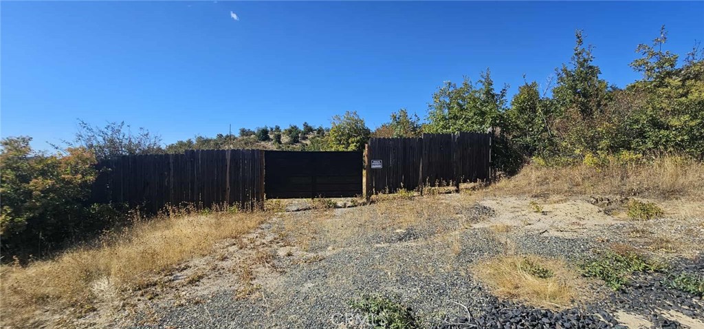 13495 Concow Road Oroville, CA 95965 - Photo 6 of 9 a backyard of a house with lots of green space