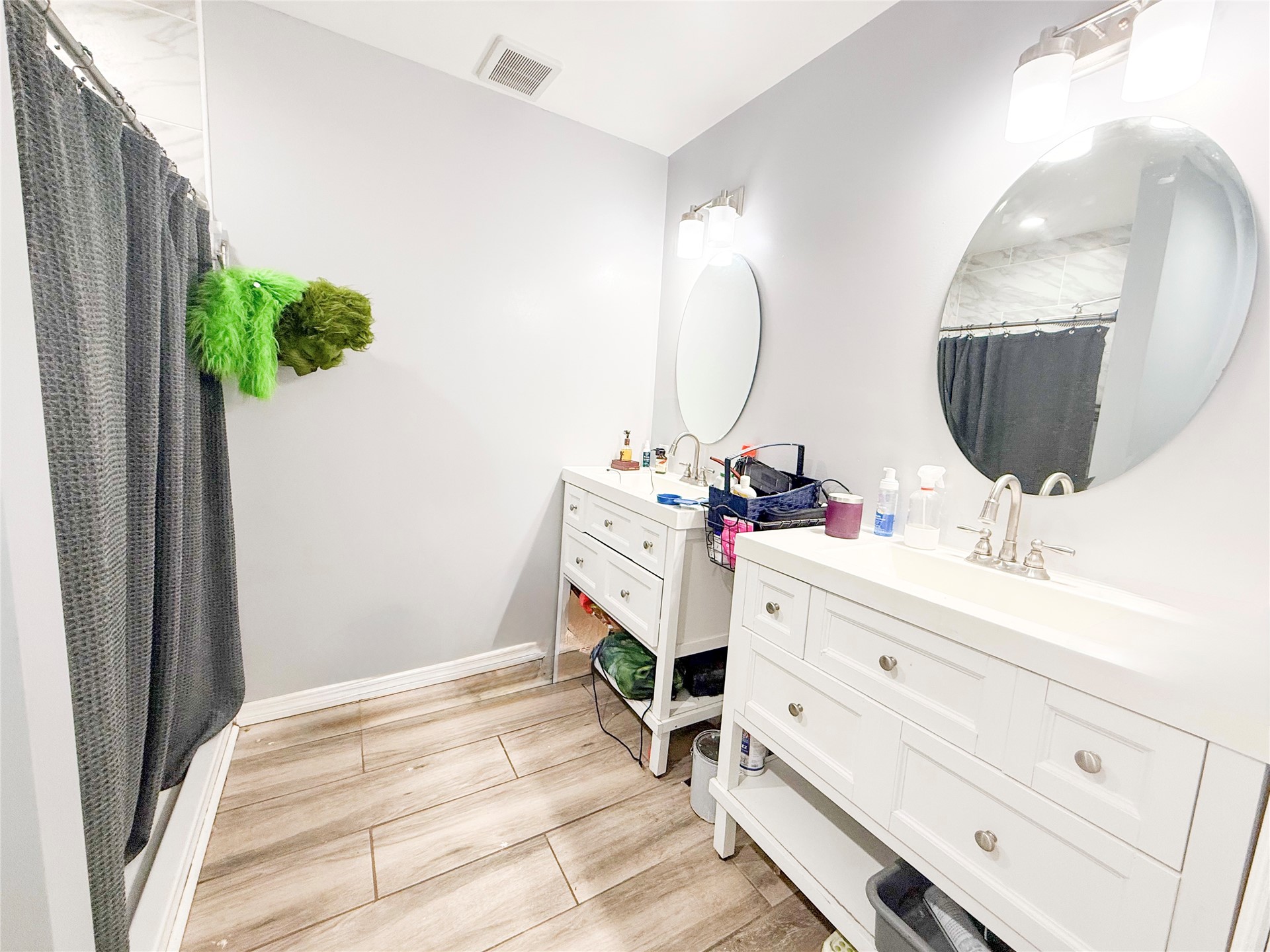 169 Center Street North Baldwin, FL 32234 - Photo 10 of 15 a bathroom with a sink vanity and mirror
