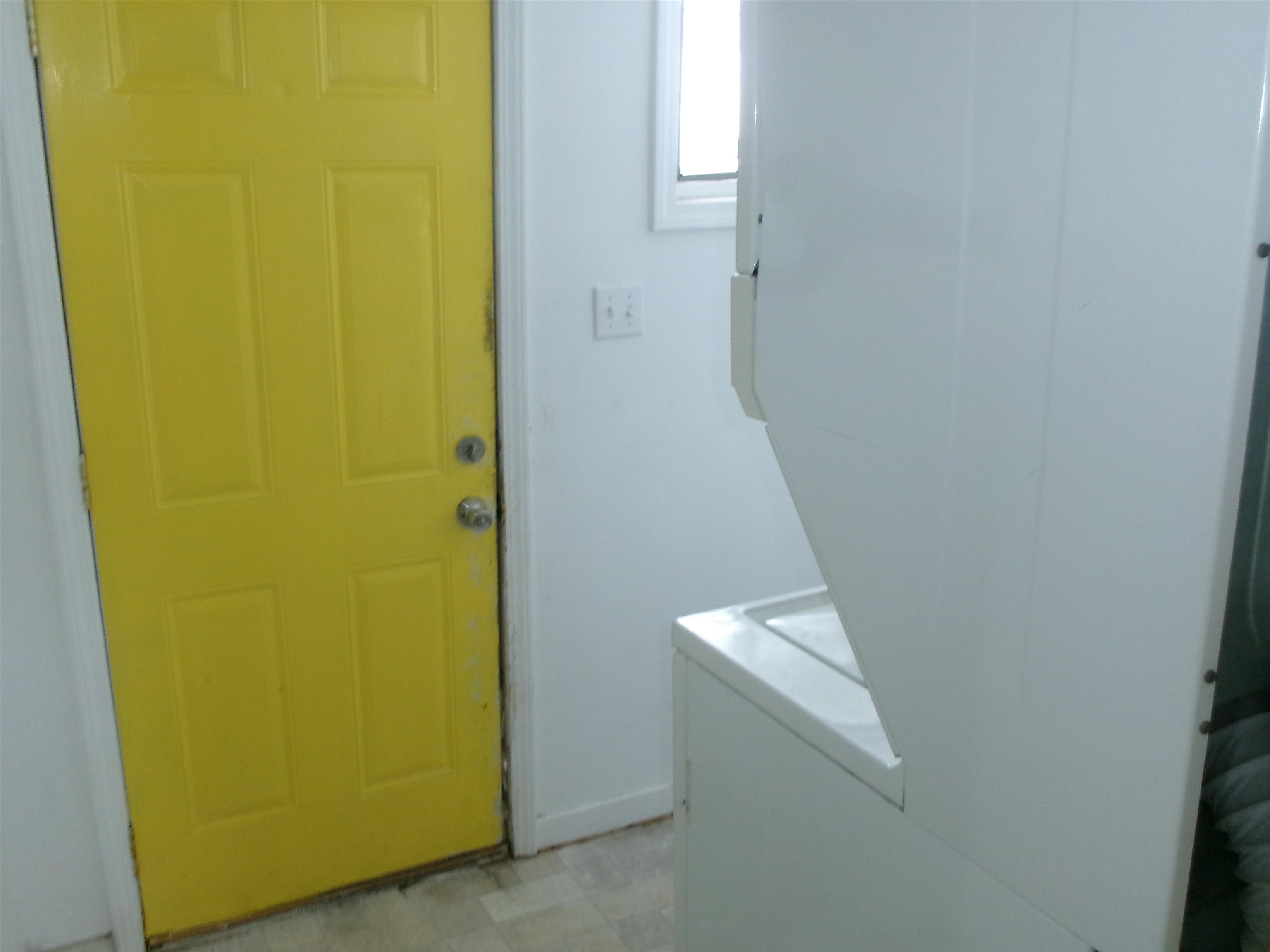 319 North Chestnut Street Princeton, IL 61356 - Photo 4 of 8 a view of a hallway with a white door