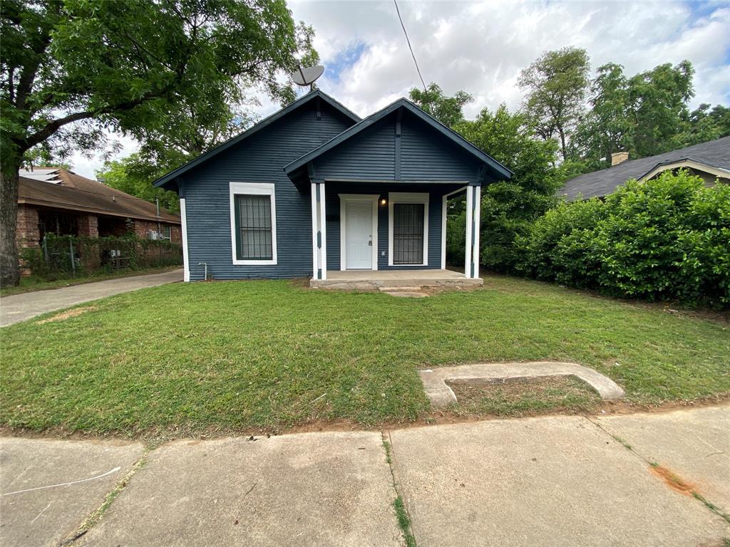 2419 Harding Street Dallas, TX 75215 - Photo 1 of 1 a view of a house with a yard and potted plants