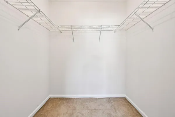 a view of a room with racks on the wall